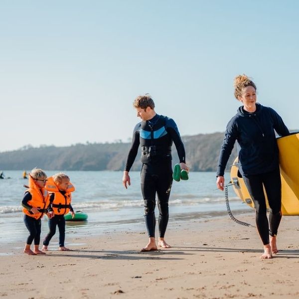 Family Enjoying Water Activities on the Saundersfoot Beach
