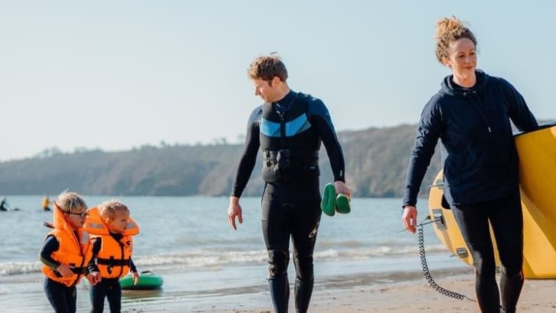 Family Enjoying Water Activities on the Saundersfoot Beach