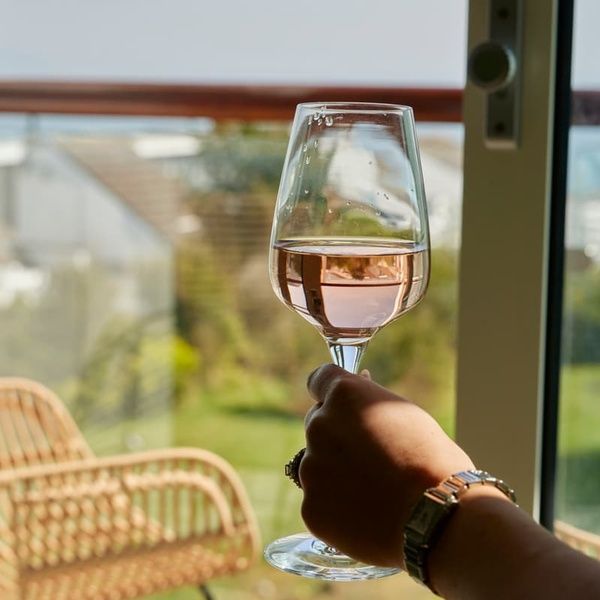 Glass of Wine in Hotel Room