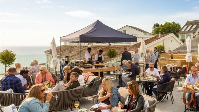 group enjoying paella on the patio at st brides